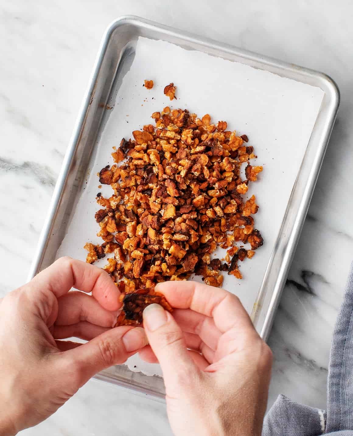 Bacon bits on a baking sheet