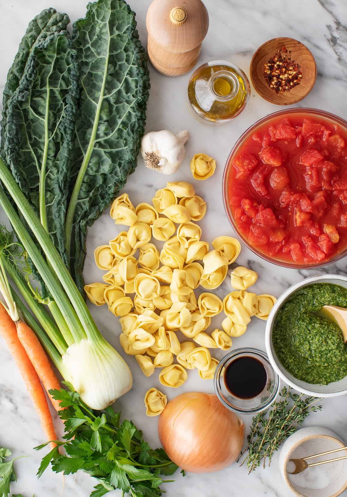 Pasta, tomatoes, olive oil, and vegetables