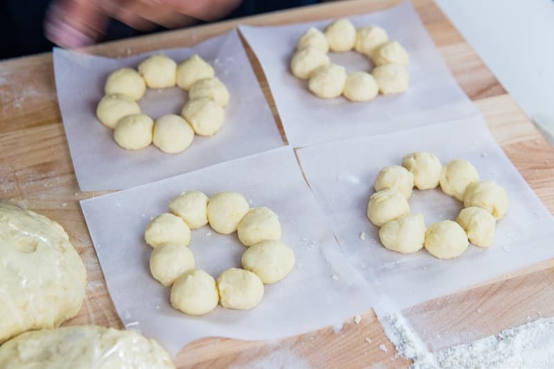 Continue forming the rest of the donut rings.