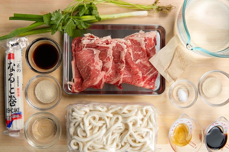 Gather all the ingredients. Bring a large pot of water to a boil for the udon noodles. Once boiling, keep it covered on low heat until you‘re ready to heat the noodles.