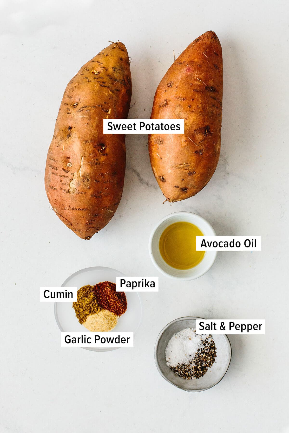 Ingredients for roasted sweet potatoes on a table.