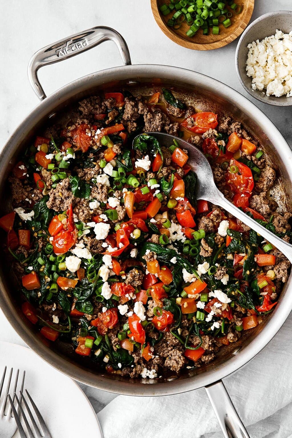 Mediterranean ground beef stir fry in a pan.