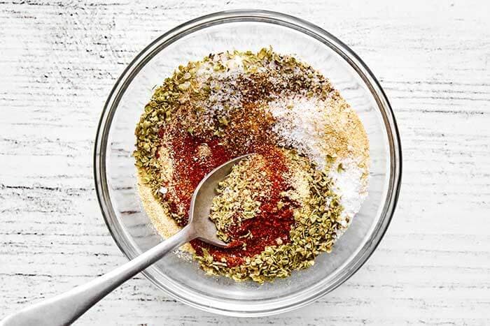 Make the seasoning. Preheat the oven to 400°F (200°C). In a small bowl, stir together the paprika, coconut sugar, garlic powder, onion powder, dried oregano, salt, and pepper.