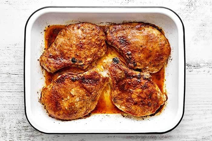 Bake the pork chops. Bake uncovered for 15 to 20 minutes, until an instant read thermometer reads 145°F (65°C). Let the pork chops rest for 5 minutes (this is important so that they remain juicy), then serve with pan juices spooned on top.